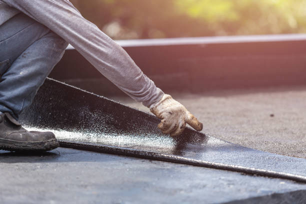 Professional Basement Waterproofing technician working in Stafford, NY